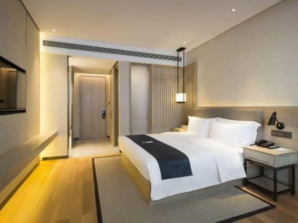 Bed in Echarm Hotel Changsha Gaoqiao