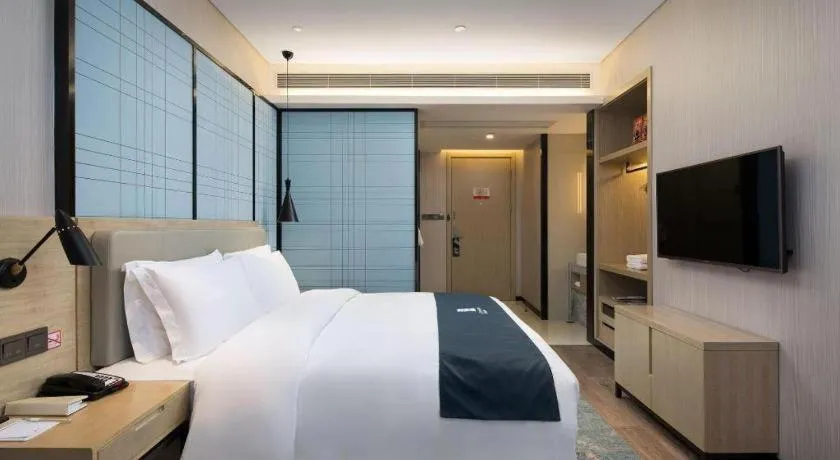 Bed in Echarm Hotel Changsha Gaoqiao