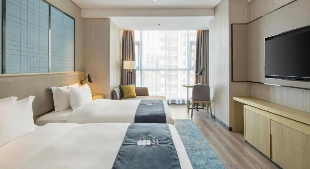 Bed in Echarm Hotel Changsha Gaoqiao