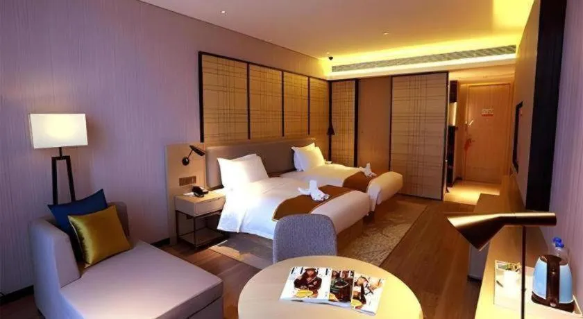 Bed in Echarm Hotel Changsha Gaoqiao