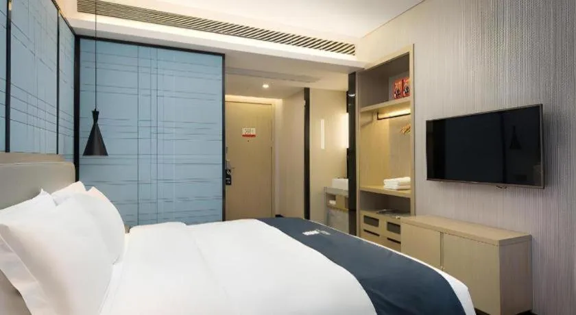 Bed in Echarm Hotel Changsha Gaoqiao