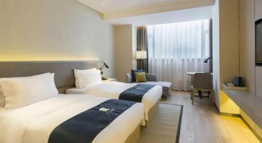 Bed in Echarm Hotel Changsha Gaoqiao