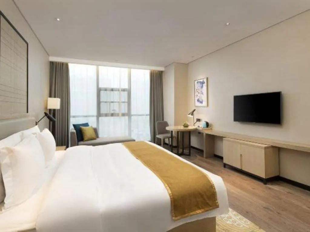 Bed in Echarm Hotel Changsha Gaoqiao