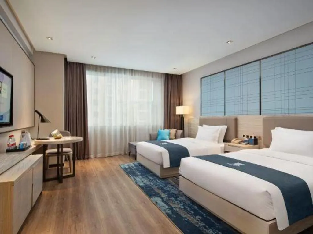 Bed in Echarm Hotel Changsha Gaoqiao