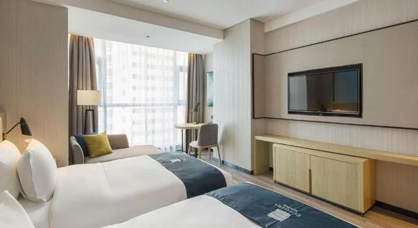 Bed in Echarm Hotel Changsha Gaoqiao