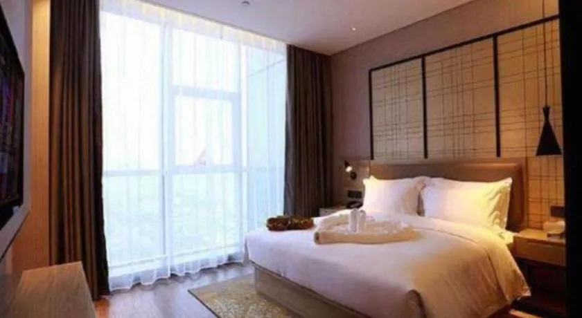 Bed in Echarm Hotel Changsha Gaoqiao