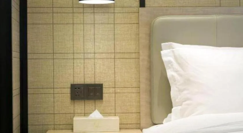 Bed in Echarm Hotel Changsha Gaoqiao