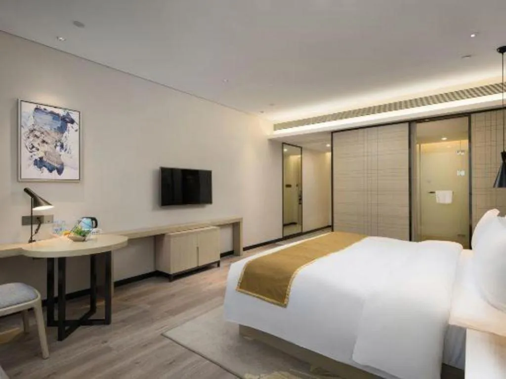 Bed in Echarm Hotel Changsha Gaoqiao