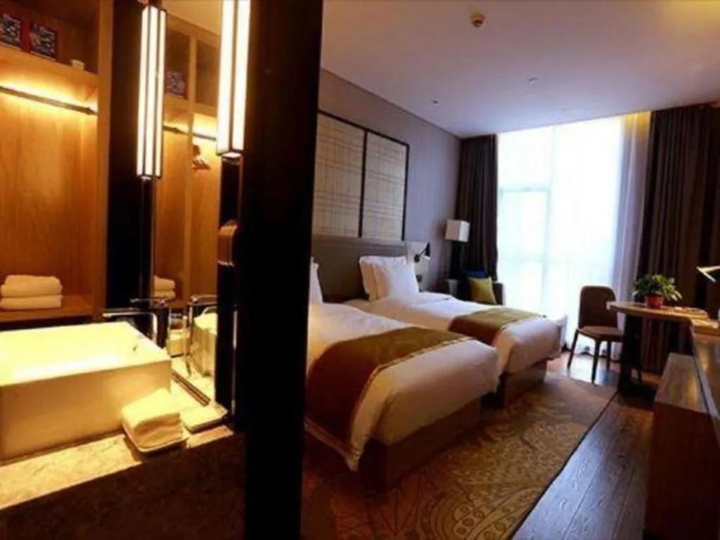 Bed in Echarm Hotel Changsha Gaoqiao