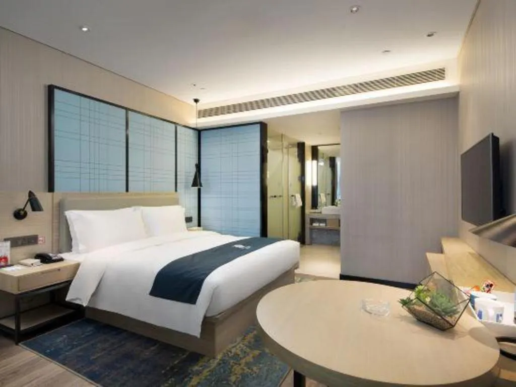 Bed in Echarm Hotel Changsha Gaoqiao