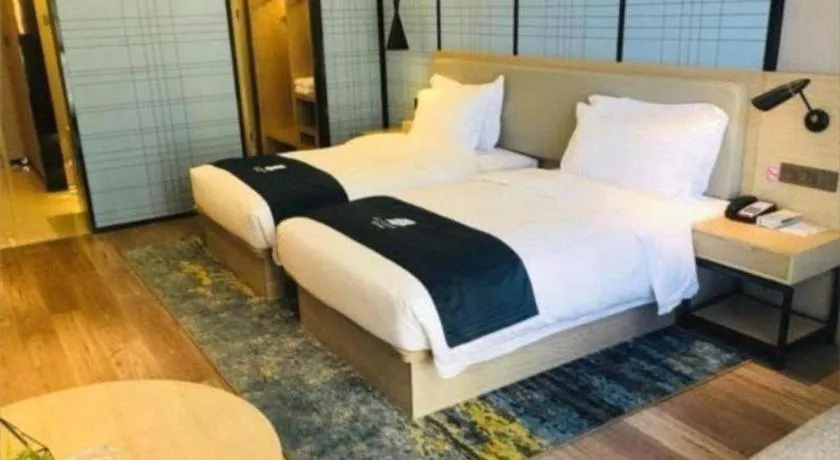 Bed in Echarm Hotel Changsha Gaoqiao
