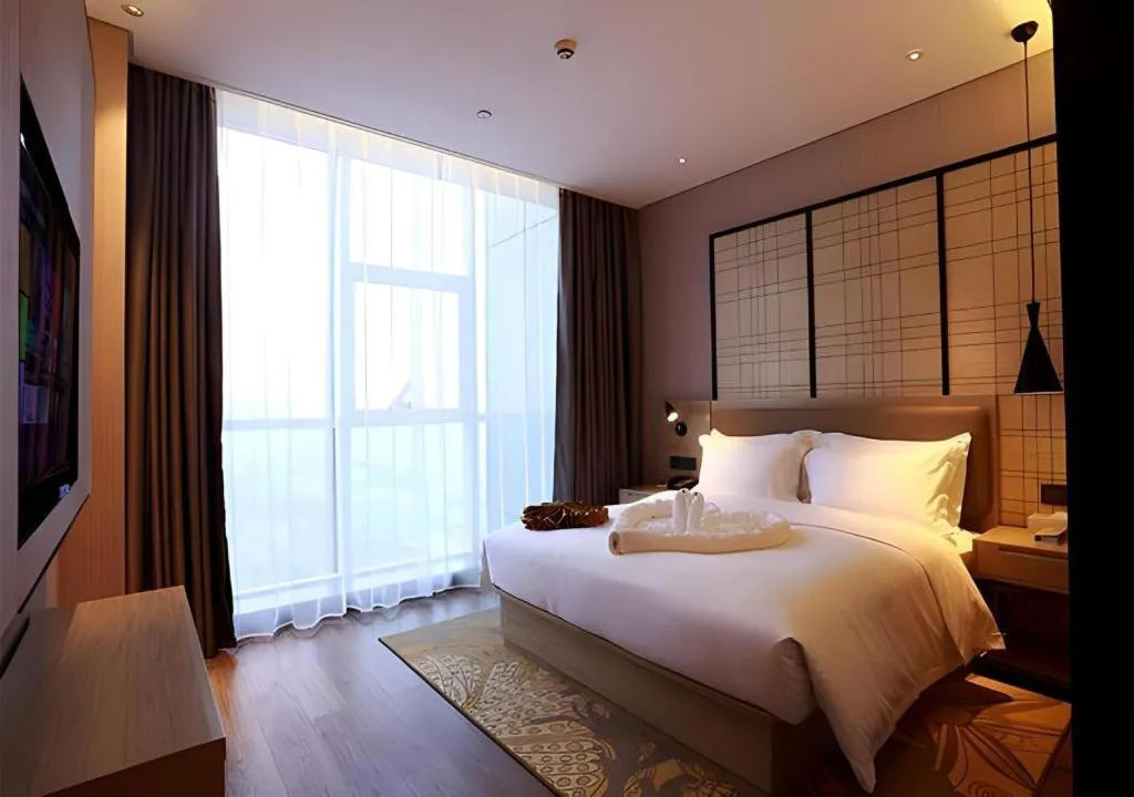 Bed in Echarm Hotel Changsha Gaoqiao