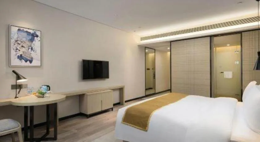 Bed in Echarm Hotel Changsha Gaoqiao