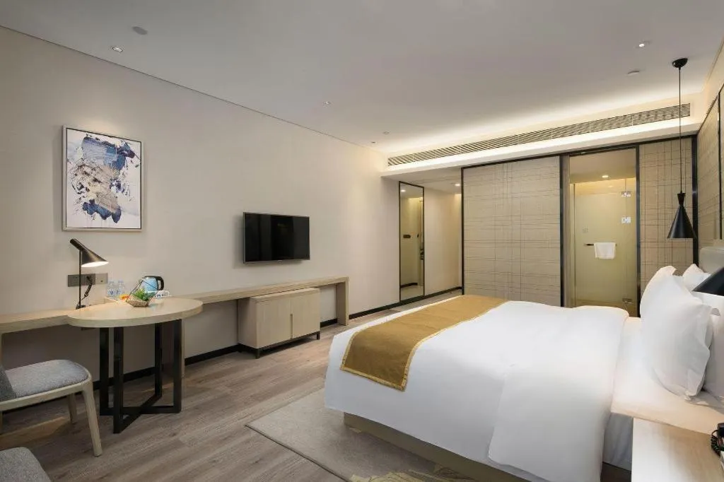 Bed in Echarm Hotel Changsha Gaoqiao