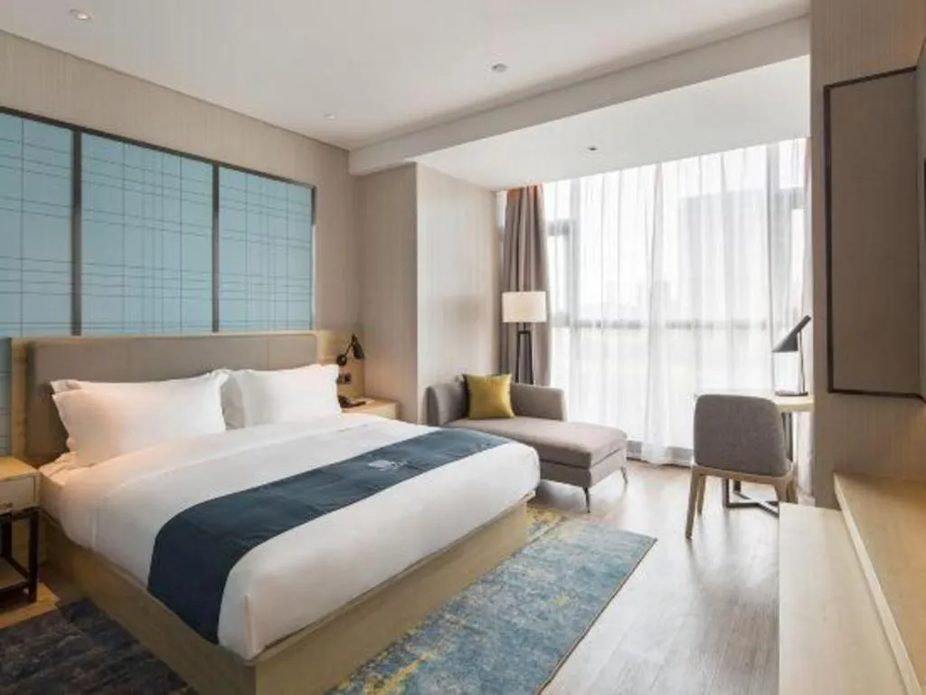 Bed in Echarm Hotel Changsha Gaoqiao