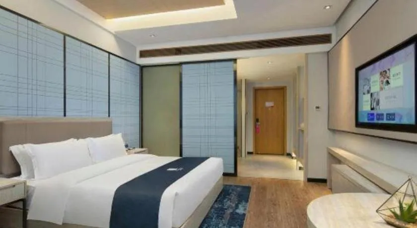 Bed in Echarm Hotel Changsha Gaoqiao