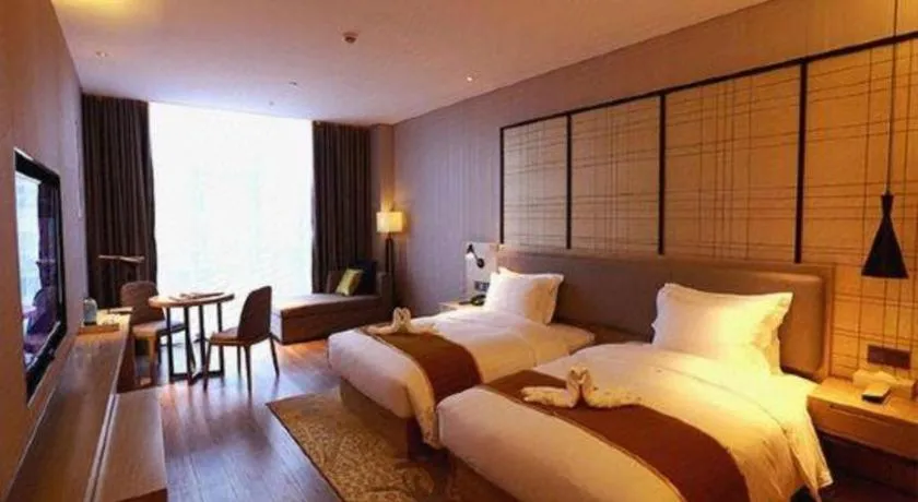 Bed in Echarm Hotel Changsha Gaoqiao