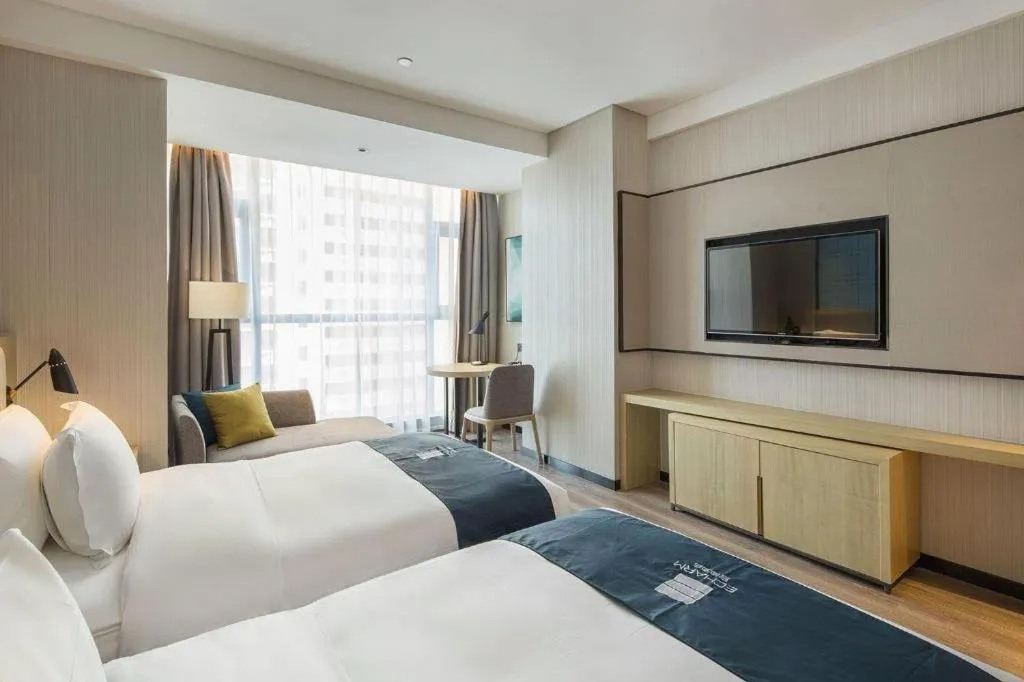 Bed in Echarm Hotel Changsha Gaoqiao