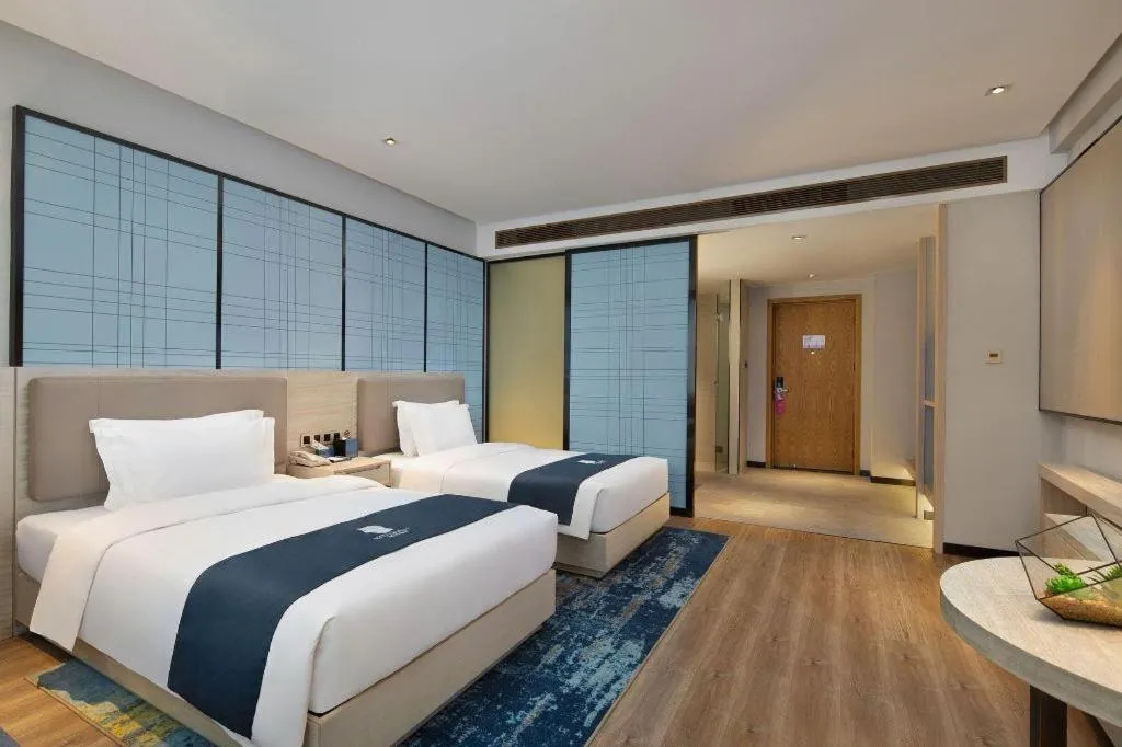 Bed in Echarm Hotel Changsha Gaoqiao
