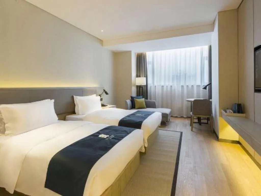 Bed in Echarm Hotel Changsha Gaoqiao