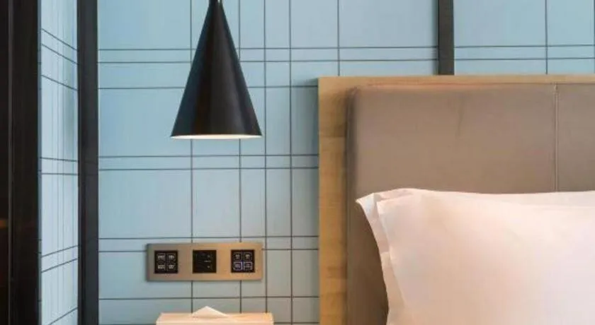 Bed in Echarm Hotel Changsha Gaoqiao