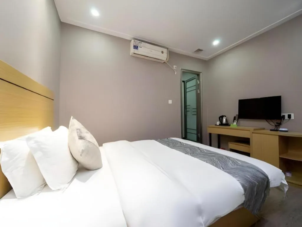 Bed in Ying Feng Yuan Hotel