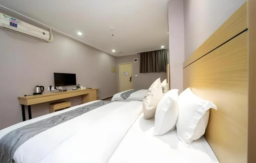 Bed in Ying Feng Yuan Hotel