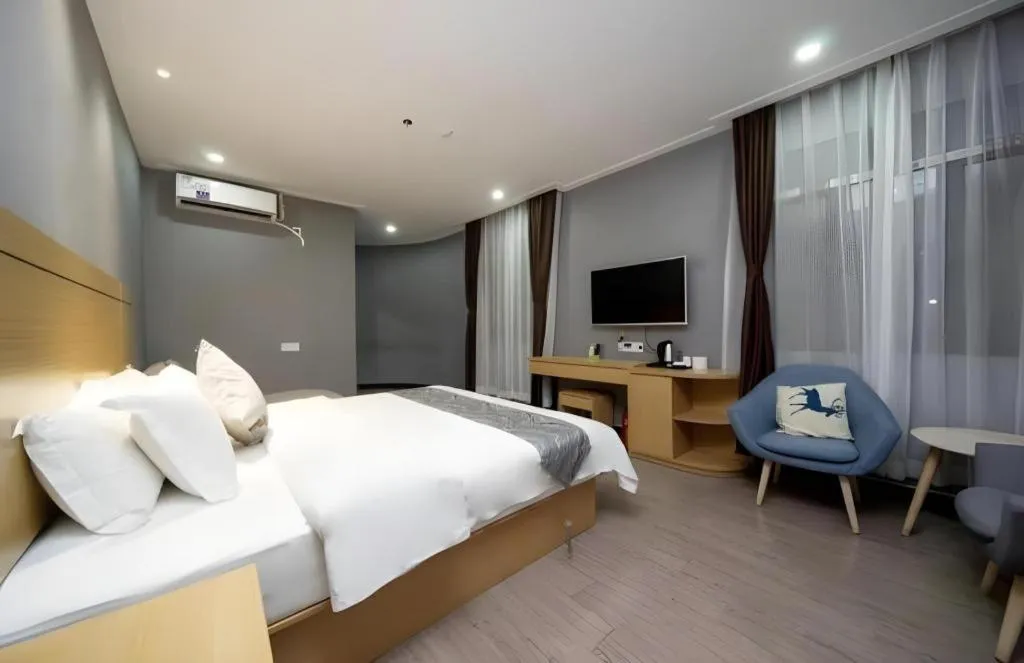 Bed in Ying Feng Yuan Hotel