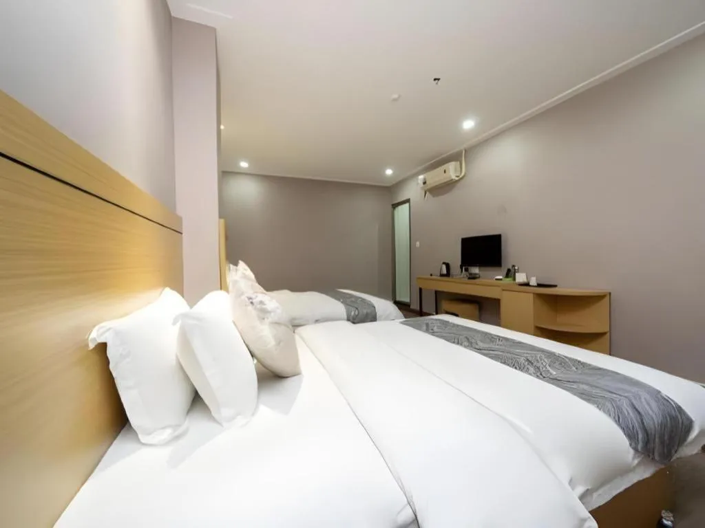 Bed in Ying Feng Yuan Hotel