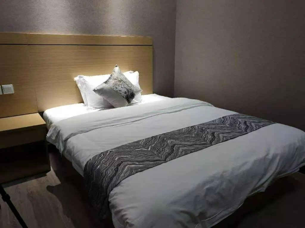 Bed in Ying Feng Yuan Hotel