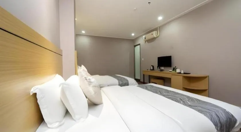 Bed in Ying Feng Yuan Hotel