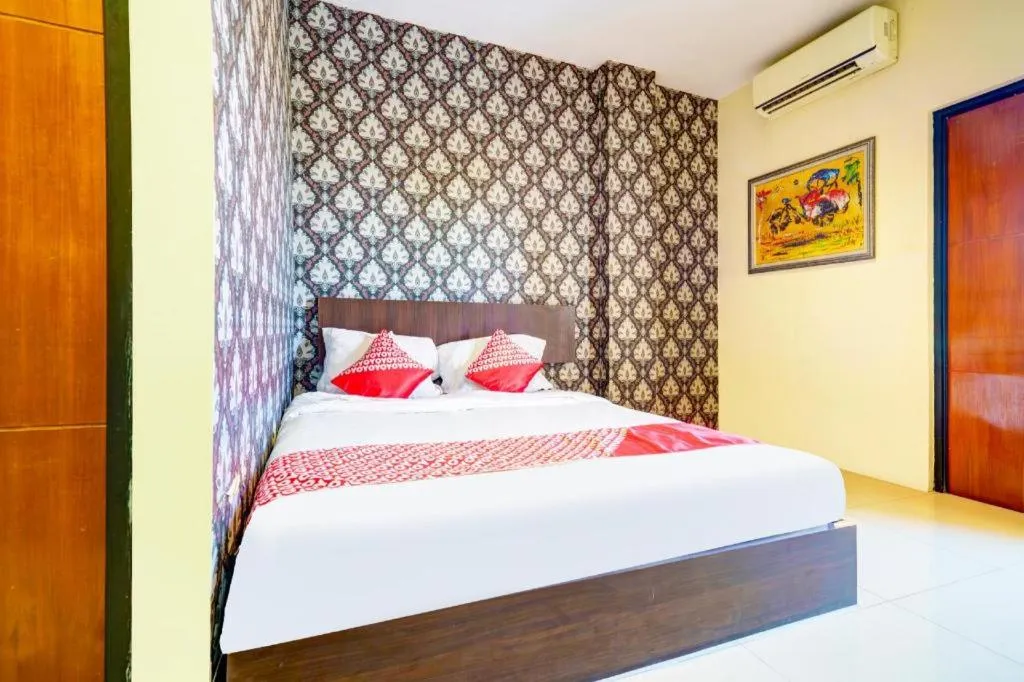 Bed in OYO Maleo Exclusive Residence near Universitas Kristen Maranatha