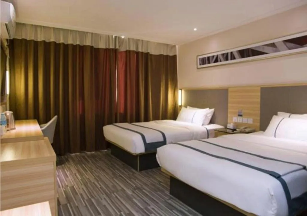 Bed in City Comfort Inn Guilin Xiangbi Mountain Park