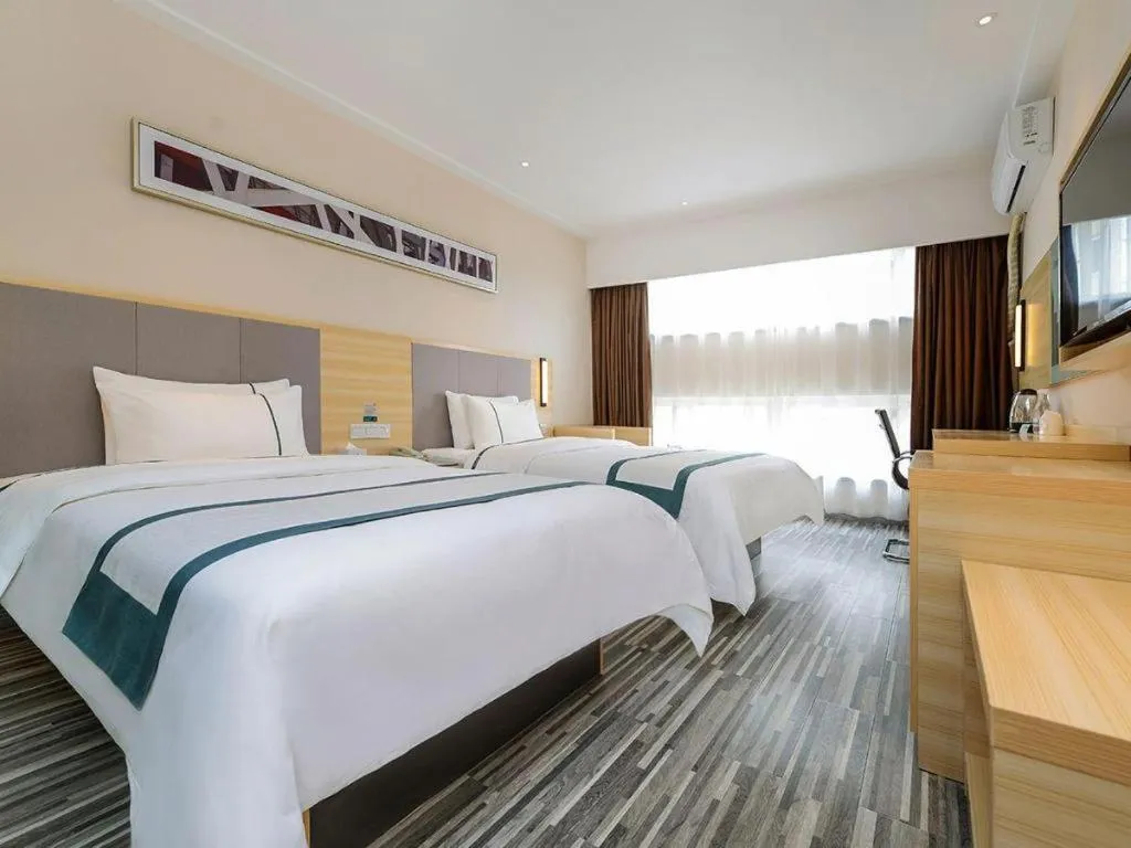 Bed in City Comfort Inn Guiyang Yan'an Middle Road Fountain Metro Station