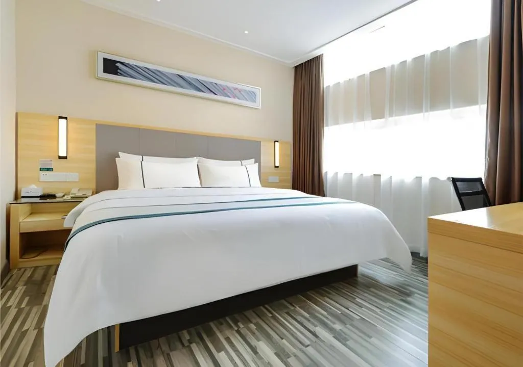 Bed in City Comfort Inn Guiyang Yan'an Middle Road Fountain Metro Station