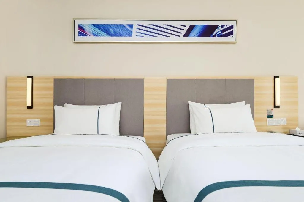 Bed in City Comfort Inn Guiyang Yan'an Middle Road Fountain Metro Station