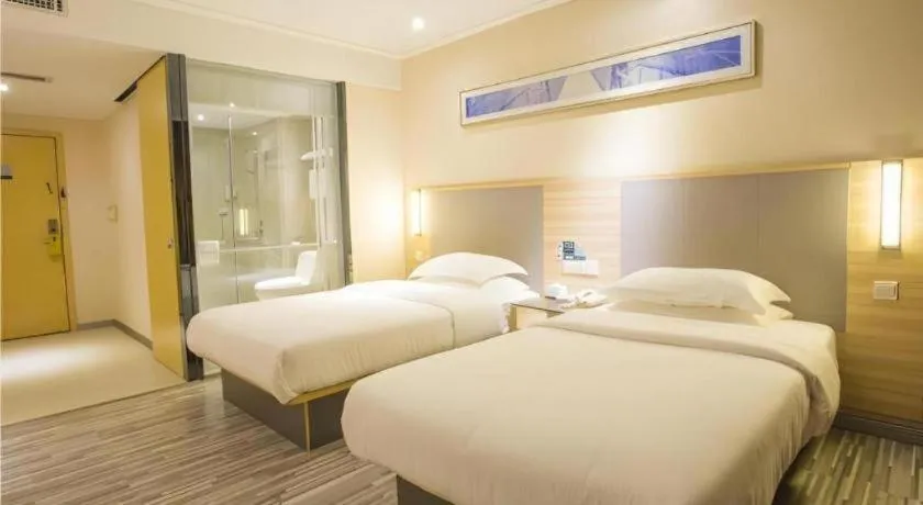 Bed in City Comfort Inn Fangcheng Qunxing Avenue