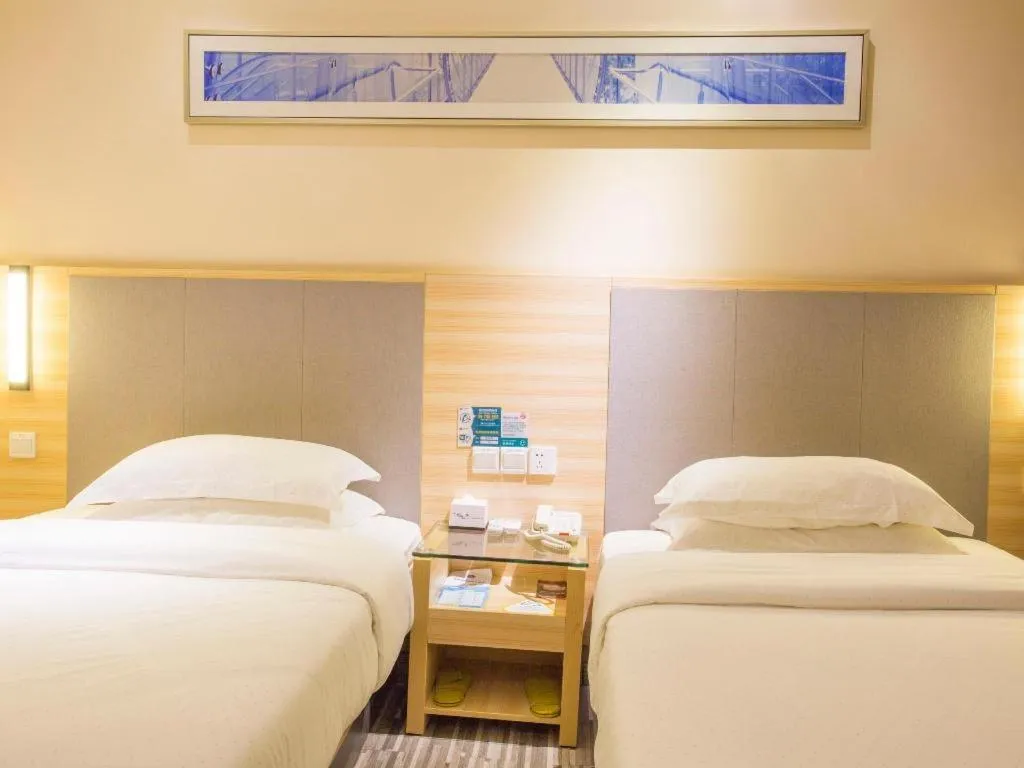 Bed in City Comfort Inn Fangcheng Qunxing Avenue