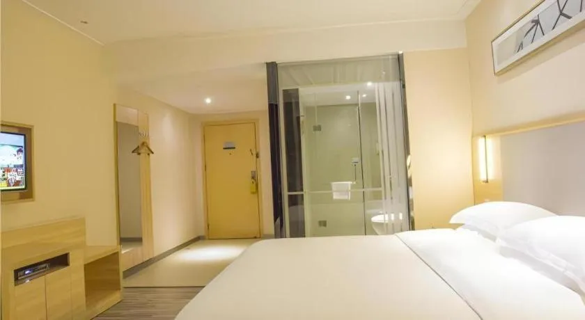 Bed in City Comfort Inn Fangcheng Qunxing Avenue