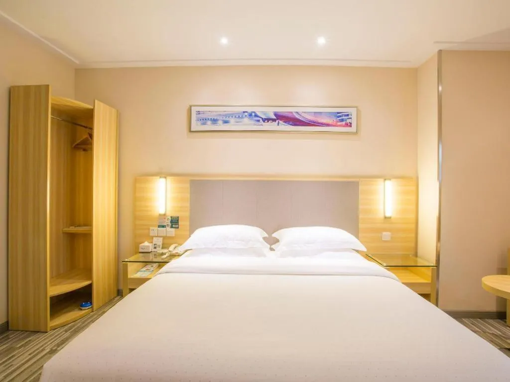 Bed in City Comfort Inn Fangcheng Qunxing Avenue