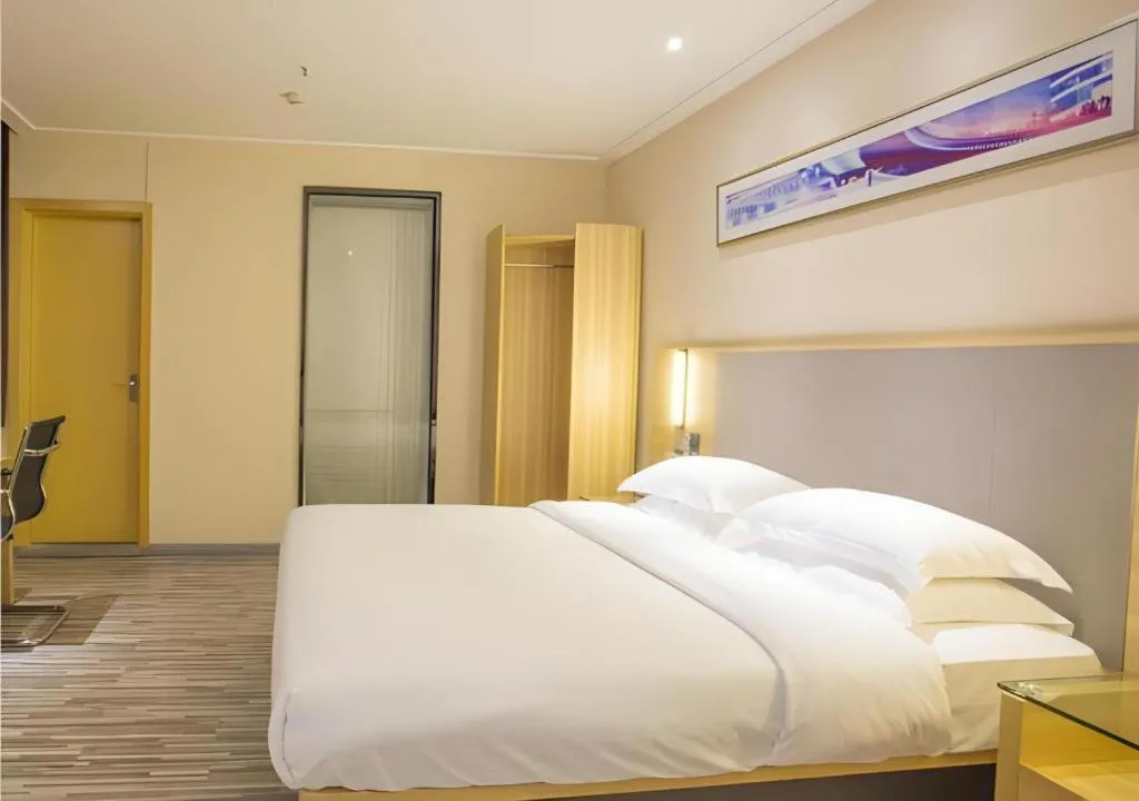 Bed in City Comfort Inn Fangcheng Qunxing Avenue