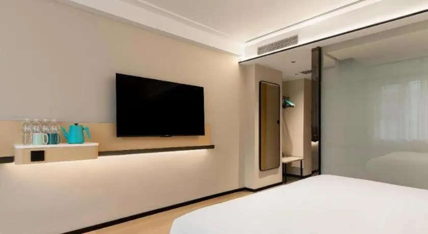 Bed in City Comfort Inn Huanggang Tuanfeng Passenger