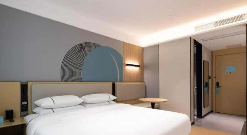 Bed in City Comfort Inn Huanggang Tuanfeng Passenger