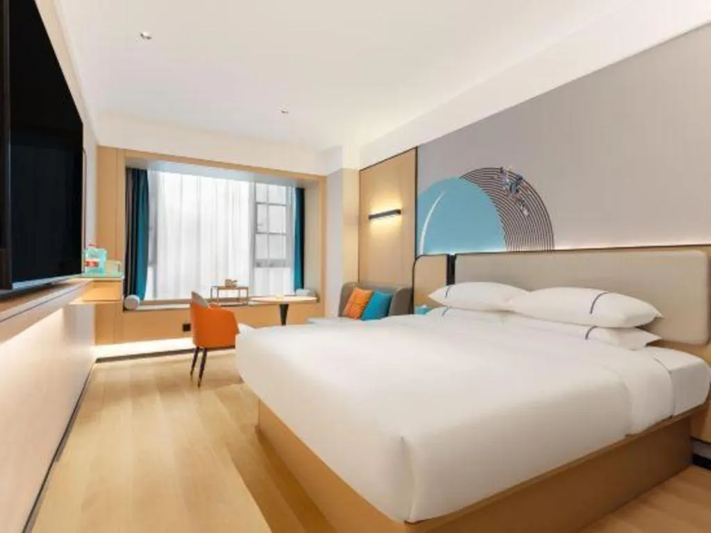 Bed in City Comfort Inn Huanggang Tuanfeng Passenger