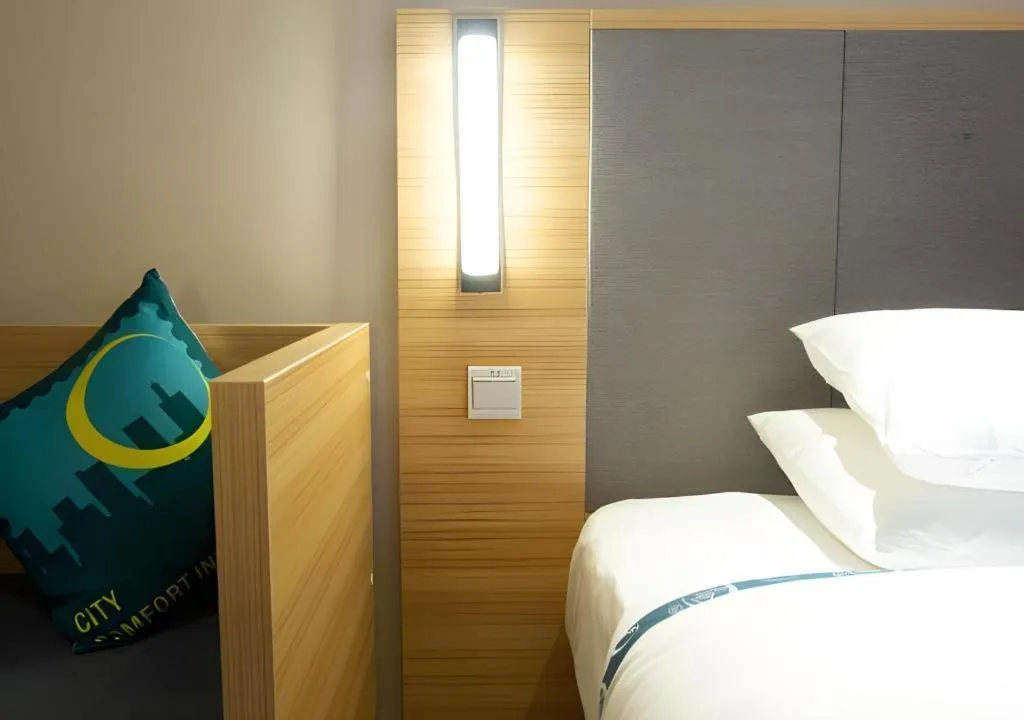 Bed in City Comfort Inn Huanggang Tuanfeng Passenger