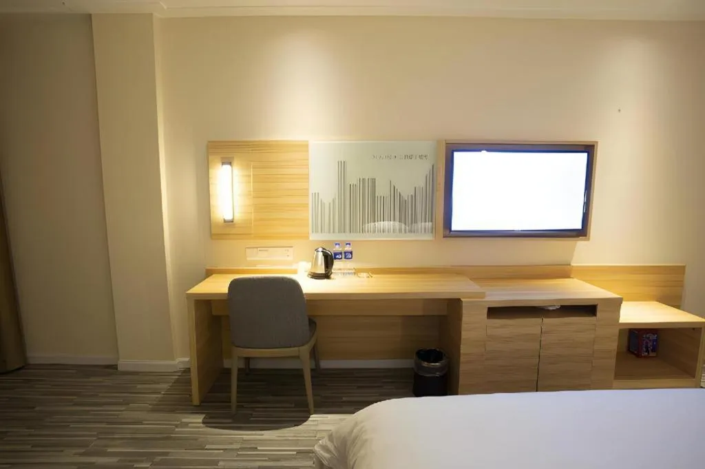 Bed in City Comfort Inn Huanggang Tuanfeng Passenger