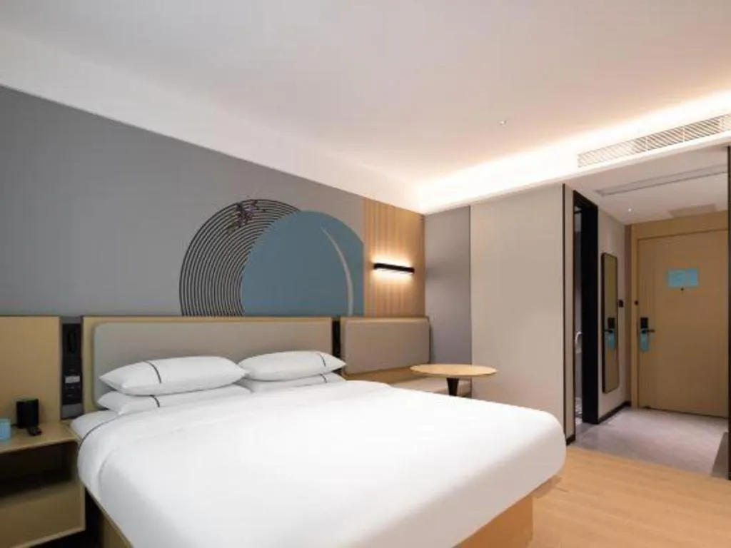 Bed in City Comfort Inn Huanggang Tuanfeng Passenger