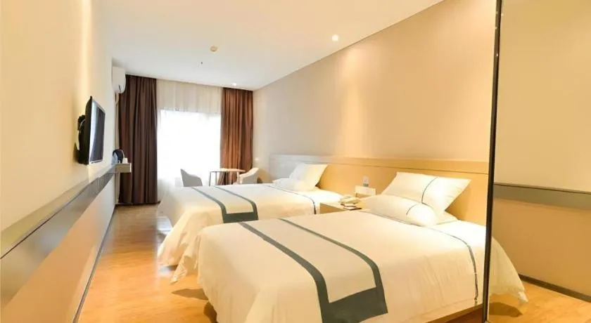 Bed in City Comfort Inn Zhuhai Qinglv Middle Road Riyuebei Grand Theater