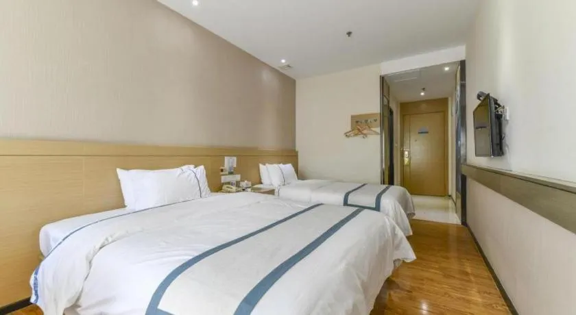 Bed in City Comfort Inn Zhuhai Qinglv Middle Road Riyuebei Grand Theater