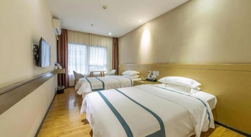 Bed in City Comfort Inn Zhuhai Qinglv Middle Road Riyuebei Grand Theater